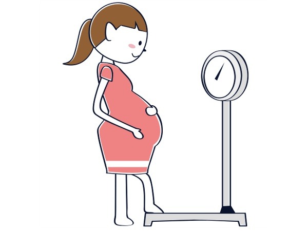 体重計に乗る妊婦のイラスト