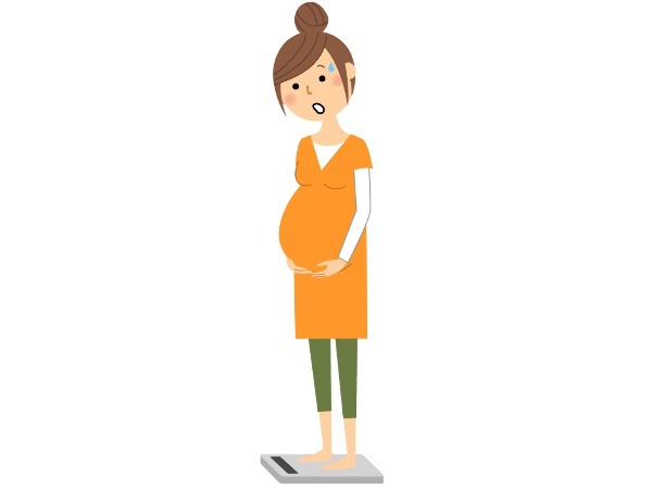 体重計に乗る妊婦のイラスト